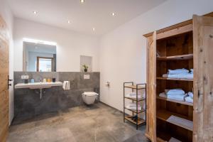 Koupelna v ubytování Schwaigermühle Apartments + 38 fotografií
