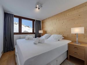 Postel nebo postele na pokoji v ubytování Superbe Appartement au Coeur de Tignes, 4 Pièces, 6 Personnes, Pieds des Pistes, Balcon, Wifi Inclus - FR-1-641-46