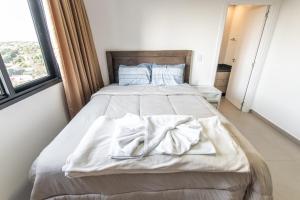 Postel nebo postele na pokoji v ubytování Cozy 2 Br In Ciudad Del Este + 15 fotografií