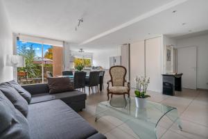 a living room with a couch and a table at Terrasse de Malissol in Vienne