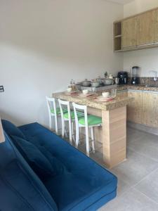 Η κουζίνα ή μικρή κουζίνα στο Residencial da Ju - Apto 02 +7 φωτογραφίες