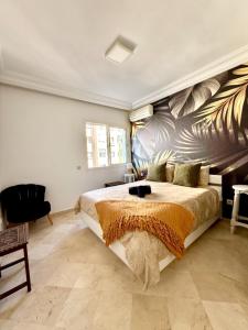 Katil atau katil-katil dalam bilik di Oumadane Appart-PROMO CAN 2025 Ocean view- Amazing apartment-International Fair and more near by
