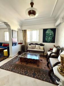 Ruang duduk di Oumadane Appart-PROMO CAN 2025 Ocean view- Amazing apartment-International Fair and more near by +23 gambar