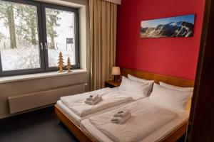 Voodi või voodid majutusasutuse k1 sporthotel - Bike & Ski inklusive Hotel toas