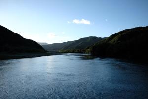 a view of a river with mountains in the background at Shimanto Suite By Hideaway 