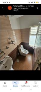 Koupelna v ubytování Hotel Devi Durga & Restaurant