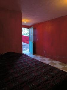 Postel nebo postele na pokoji v ubytování Mini Departamento con áreas compartidas