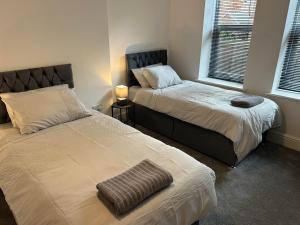 Katil atau katil-katil dalam bilik di Serviced apartment, Central Grimsby -Bargate