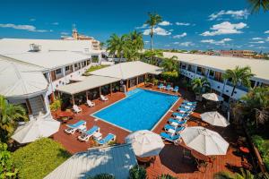 an aerial view of the resort with a swimming pool at Best Western Plus Belize Biltmore Plaza in Belize City