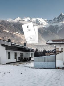 a building with a sign that reads n castles at Chalet Pirchhof inklusive Sauna in Sautens