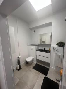 Ένα μπάνιο στο L'Arsenal studio