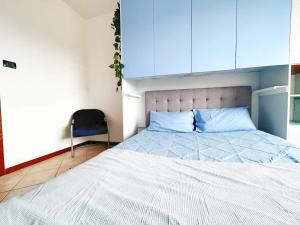 Ένα ή περισσότερα κρεβάτια σε δωμάτιο στο All'Arco Apartment