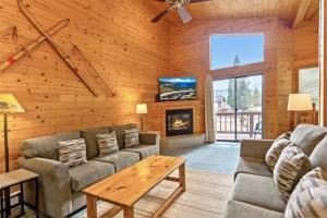 a living room with a couch and a fireplace at 589 Danube Drive condo in Lake Valley