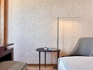 Postel nebo postele na pokoji v ubytování Domus Renier Boutique Hotel