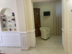 TV a/nebo společenská místnost v ubytování Villa Nicole House - Apartments & Suite