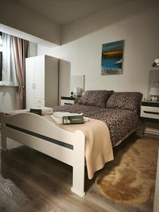 Katil atau katil-katil dalam bilik di Apartman Relax