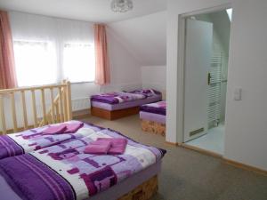 Postel nebo postele na pokoji v ubytování Apartment U Erlebachů
