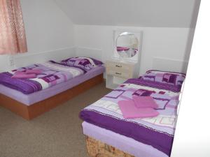 Postel nebo postele na pokoji v ubytování Apartment U Erlebachů