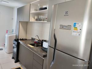 Kuchyň nebo kuchyňský kout v ubytování Apartamento Edificio Monfort Cop30