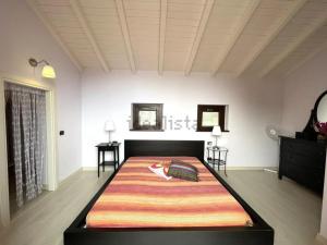 Ένα ή περισσότερα κρεβάτια σε δωμάτιο στο Dream Villa in Stresa