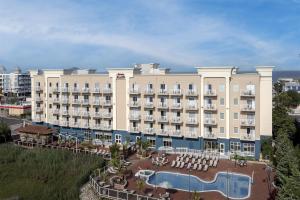 a large hotel with a pool and a resort at Hampton Inn & Suites Ocean City Bayfront-Convention Center in Ocean City
