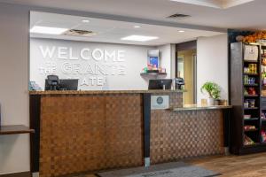 a welcome to the grandeline office reception counter at Hampton Inn Portsmouth Central in Portsmouth +57 photos