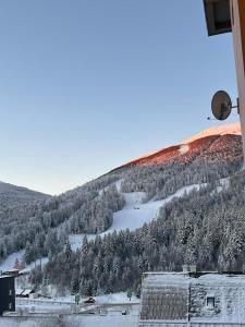 a view of a snow covered mountain with a ski slope at Alta Vista Bjelašnica in Bjelašnica