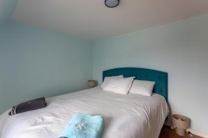 Postel nebo postele na pokoji v ubytování Maison Melville - Gestas