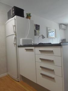 Kuchyňa alebo kuchynka v ubytovaní Apartment Aloha Sitges