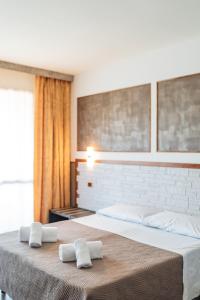 Katil atau katil-katil dalam bilik di Hotel Carignano +46 gambar