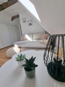 Postel nebo postele na pokoji v ubytování Lichtdurchflutete Dachgeschosswohnung mit Charme