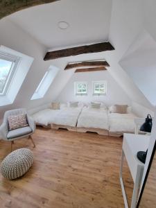 Posezení v ubytování Lichtdurchflutete Dachgeschosswohnung mit Charme