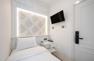 TV a/nebo společenská místnost v ubytování Wyneth Hotel Airport