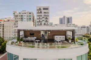 a building on top of a city at Chic Elegant City Center Condo in La Julia