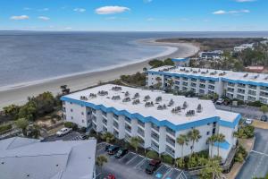 an aerial view of a hotel and the beach at Fin's Watch in Tybee Island