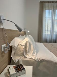 Ένα ή περισσότερα κρεβάτια σε δωμάτιο στο Central Apartment