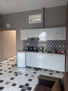 Kuchyň nebo kuchyňský kout v ubytování Bulvar