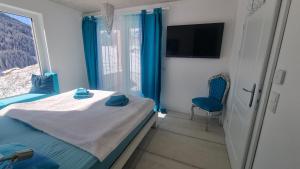 Ένα ή περισσότερα κρεβάτια σε δωμάτιο στο Blue Mountain Suite