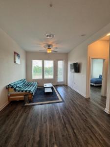 a living room with a couch and a table at Pleasant apartment in Austin in Leander