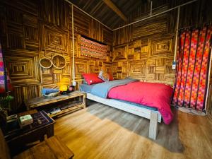 Postel nebo postele na pokoji v ubytování Gõ Kiến Homestay