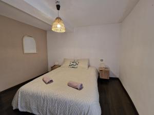 Postel nebo postele na pokoji v ubytování La Glycine