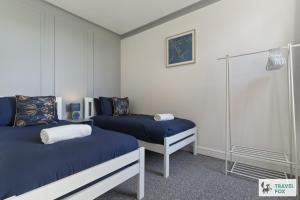 Postel nebo postele na pokoji v ubytování Mia's House: Park view +Parking