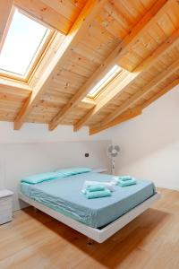 Cama o camas de una habitación en Lago di Monate Apartment