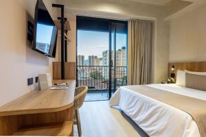 Ένα ή περισσότερα κρεβάτια σε δωμάτιο στο Hotel Tres Altares Sabaneta +57 φωτογραφίες