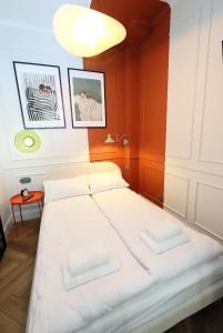 Ένα ή περισσότερα κρεβάτια σε δωμάτιο στο Rosette Residence 2 z tarasem AC Progres