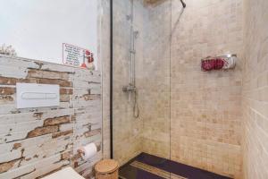a bathroom with a glass shower with a toilet at Marina Vila House, Vista Playa in El Masnou +42 photos