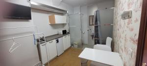 Kuchyň nebo kuchyňský kout v ubytování Campo do Boi A