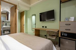 Μια τηλεόραση ή/και κέντρο ψυχαγωγίας στο Hotel Tres Altares Sabaneta