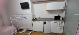 Kuchyň nebo kuchyňský kout v ubytování Campo do Boi A