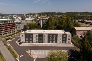 an aerial view of a building with a parking lot at The Ruby 301 By Avada Properties in Pigeon Forge